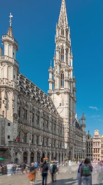 The Grand-Place (Grote Markt) timelapse hyperlapse in Brussels, Belgium. Brabantine Gothic Town Hall, Baroque guildhalls and bustling tourists in the historic city center. UNESCO World Heritage Site