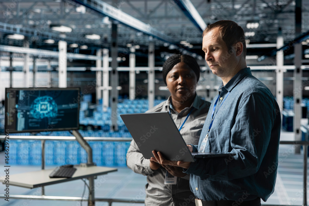 Poster teamworking data center technicians analyzing equipment performance, resolving technical issues. ser