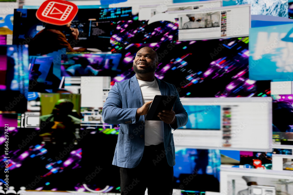 Poster black young social network user checks dashboards with dynamic screens showcasing social media and n