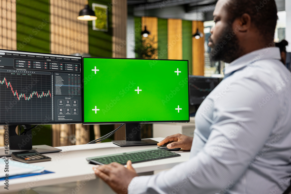 Poster risk analyst using green screen pc to evaluate trading strategies, minimizing losses and improve ret