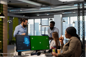 Programmer in tech startup uses AI on chroma key PC to optimize performance and forecast issues....