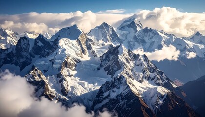 Majestic mountain range, snow-capped peaks, clouds © Cintaiaku