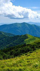 Obraz premium Mountain landscape with lush green valleys