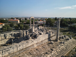 Ancient temple of apollo in didyma towers above didim, marble steps and broken columns surround the naos, warm light reveals relief and age, legacy of ionian culture in Turkey is seen from above