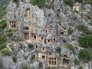 Close detail of Lycian cliff tomb facades at Myra in Demre, Antalya, Turkey, columns and doorways...