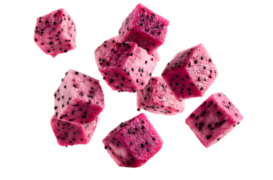 Pink dragon fruit cubes, in a pink color with black dots, floating in the air on a white background.