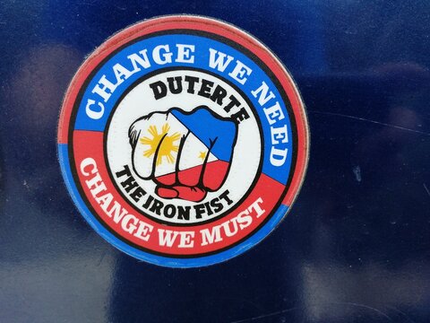 Sticker on Philippine MHD bus with political slogan about Duterte and Iron Fist