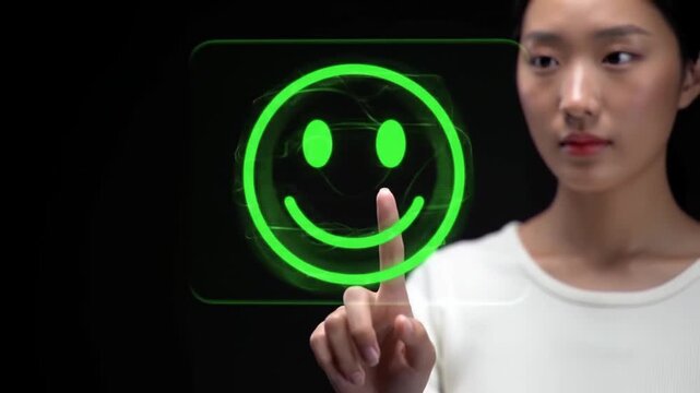 Customer satisfaction feedback &ndash; Person pressing glowing green smiley face hologram for positive feedback, futuristic UX interface, dark background