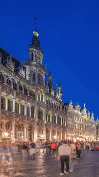 The Grand-Place (Grote Markt) day to night transition timelapse hyperlapse in Brussels, Belgium. Brabantine Gothic Town Hall, Maison Grand-Place and tourists in the historic city center after sunset