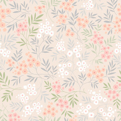 Beautiful floral pattern in small vintage flowers. Small white, pink and orange flowers. Ivory beige background. Ditsy print. Floral seamless background. Gentle template for fashion prints. Stock 
