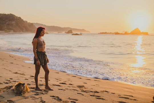 woman walking on the beach