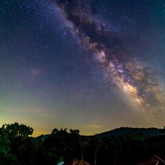 Fototapeta premium Milky Way over a landscape