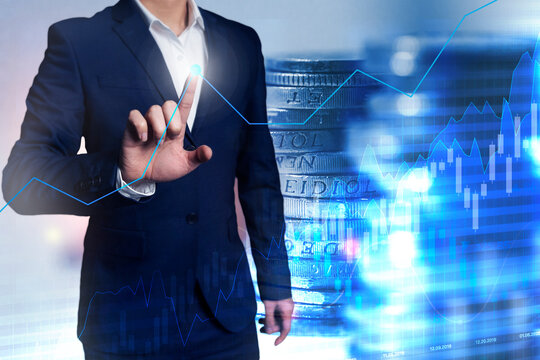 Stock market and chart trading graph with coin stacking background suitable for financial investment concept. Economy trends background for business idea