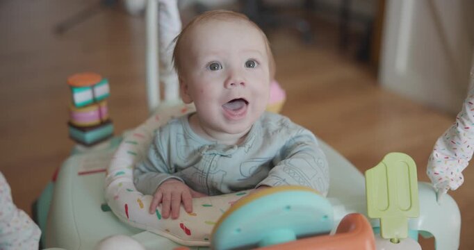 Cute Baby in Bouncer