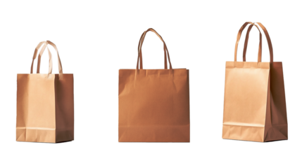 A set of three brown paper shopping bags with various colors for retail