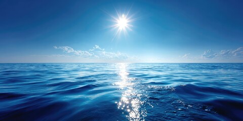 Obraz premium Vast ocean expanse under a brilliant blue sky
