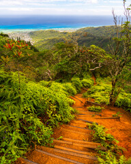 Scenic view from Kuliouou Ridge in Oahu, Hawaii, overlooking lush green mountains, the coastline,...