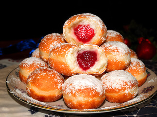 Delicious Jam-Filled Doughnuts with Powdered Sugar