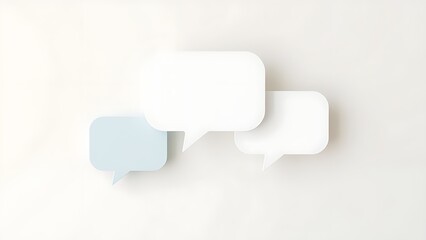 Floating speech bubble shapes on a neutral background, representing communication and feedback.