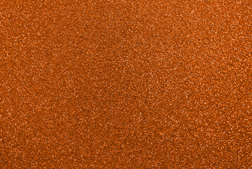 Orange glitter background, shiny sparkling glitter particles creating a beautiful textured effect for website, marketing and social media, abstract sparkles, flame red and rust colored sequins