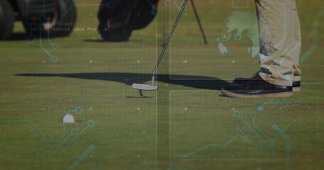 Putting golfer in golf pants moving putter over putting green, with white golf ball, blurred gear