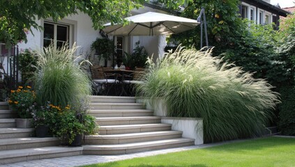 Obraz premium Outdoor patio with stone steps and lush plantings