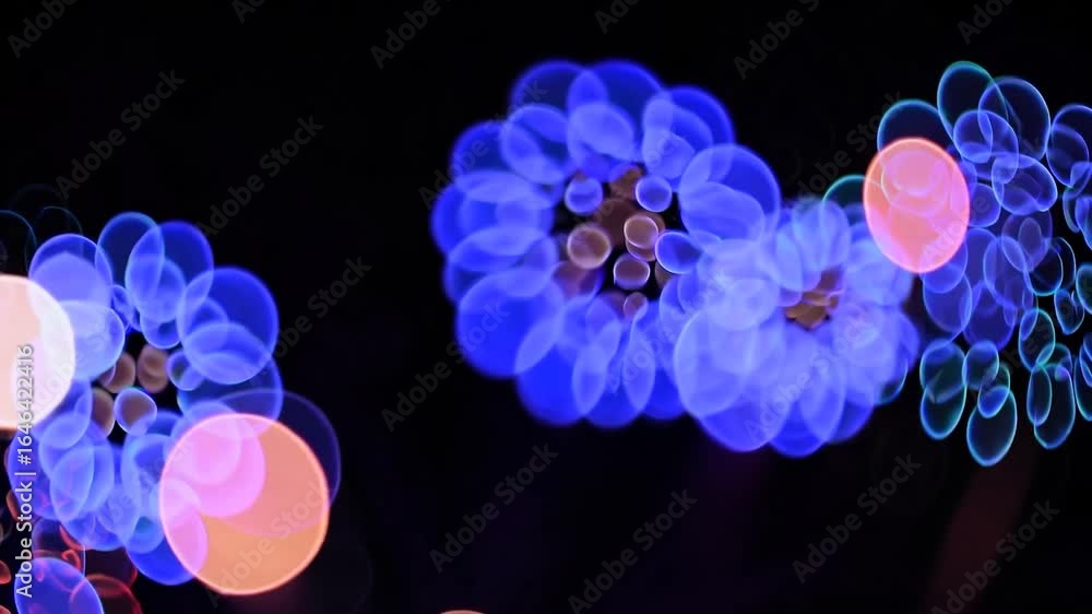 Poster colorful bokeh lights blending dynamically, sparkling in vibrant patterns against deep black backdro