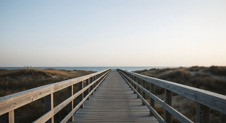 Pathway to Serenity: A tranquil wooden boardwalk extends gracefully towards the calming ocean, framed by gentle dunes and the endless expanse of the sky, evoking a sense of peace and freedom.