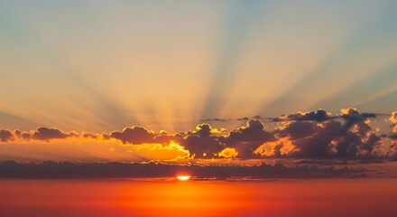 Fototapeta premium Majestic sunset casting golden rays through clouds over a serene horizon