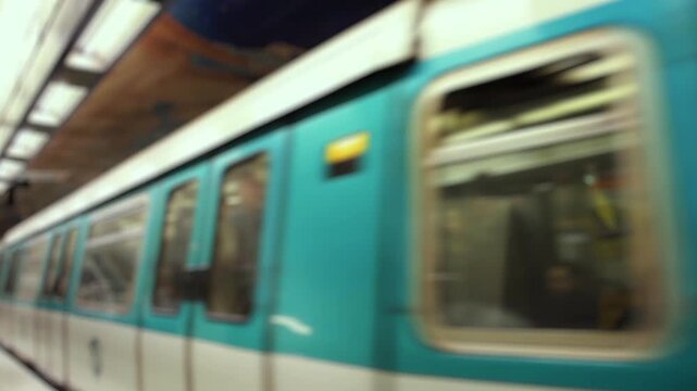 Blurred Paris Metro Train Arriving at Station, France