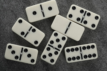 white domino blocks on black background