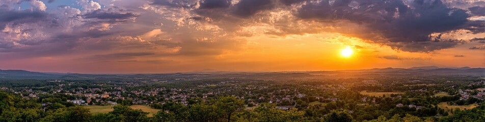 Panoramic sunset over a sprawling town