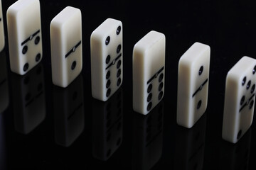 white domino blocks on black background