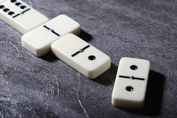 white domino blocks on black background
