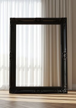 Ornate Black Picture Frame on Wooden Floor with Sheer White Curtains Creating an Elegant and Sophisticated Interior Design Element