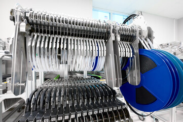Efficient SMT pick-and-place machine with multiple tape feeders in a modern assembly environment