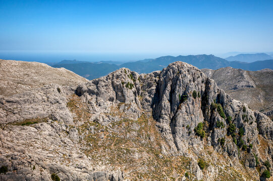 Drone aerial view of mountain peaks in Sardinia, Italy, near Sin