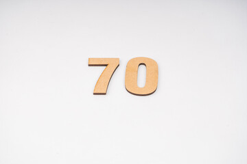 Number seventy in paper on a white background.