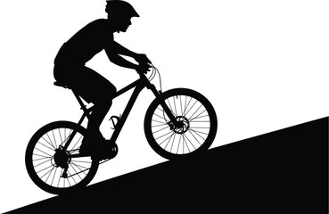 Silhouette of a mountain biker riding uphill, showcasing thrill of extreme sports and beauty of nature
