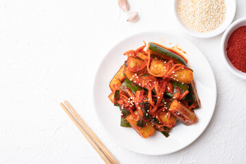 Top view of Korean kimchi cucumber on white background, Korean side dish, Homemade food