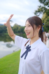 A young woman wearing a white shirt. A Student girl concept