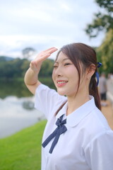 Naklejka premium A girl wearing a white shirt. A Student girl concept