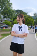 A woman wearing a white shirt. A Student girl concept