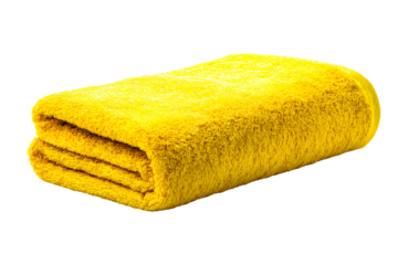 Soft Yellow Towel Folded neatly on black background