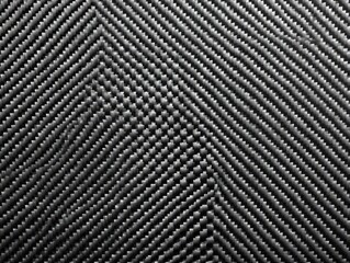 Textured black fabric with diagonal lines and small bumps