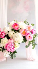 Obraz premium Lush pink and white peonies and hydrangeas arranged artfully against a soft pink backdrop