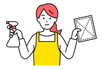 スプレー洗剤と雑巾を持つエプロン姿の女性
