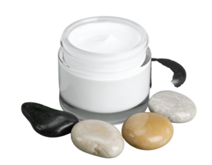 Close-Up Angled View of Day Spa Set with Facial Mask Jar and Smooth Stones