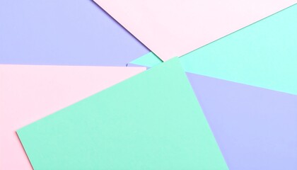 Pastel-colored paper sheets arranged in an overlapping, radial pattern