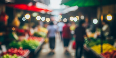 Obraz premium Blurred market scene with people and produce under colorful awnings and lights, vibrant evening energy with scents and colors filling the busy street.